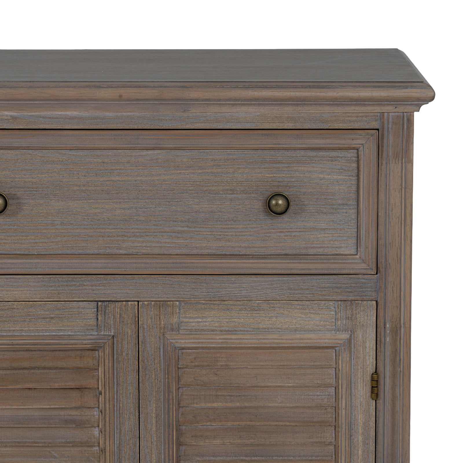 Corner detail of the Laurent Large Wood Dresser Cabinet highlighting the solid wood construction, framed drawer fronts, shutter-style cupboard doors, antique metal hardware and natural wood finish.