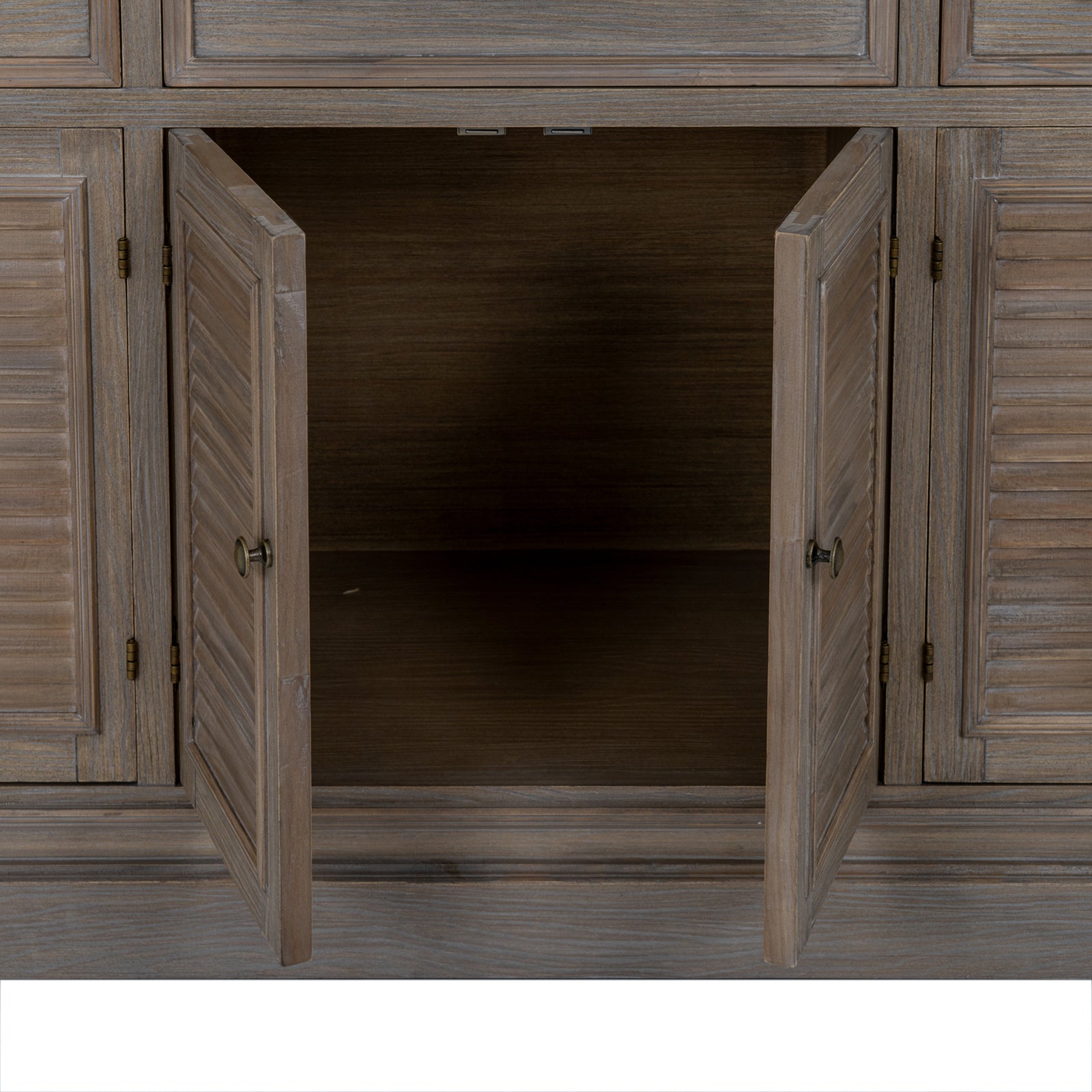 Open cupboard compartment of the Laurent Large Wood Display Cabinet Set displaying generous concealed storage space behind solid wood louvred cabinet doors.