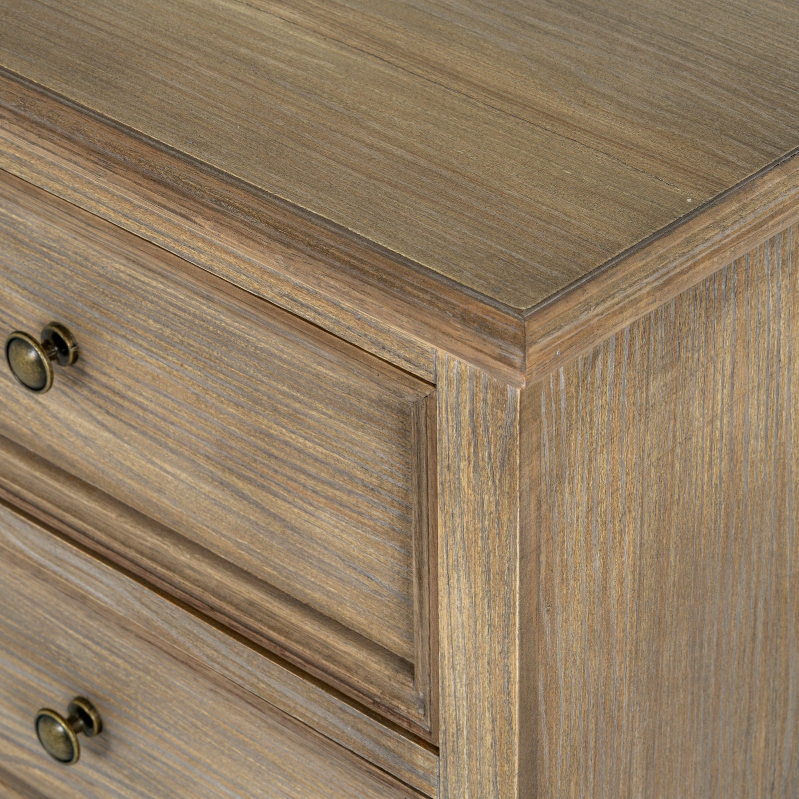 Close-up of the Laurent Wood Chest of Drawers with 3 Drawers highlighting the natural wood grain, handcrafted corner detailing, framed drawer fronts and premium rustic finish.