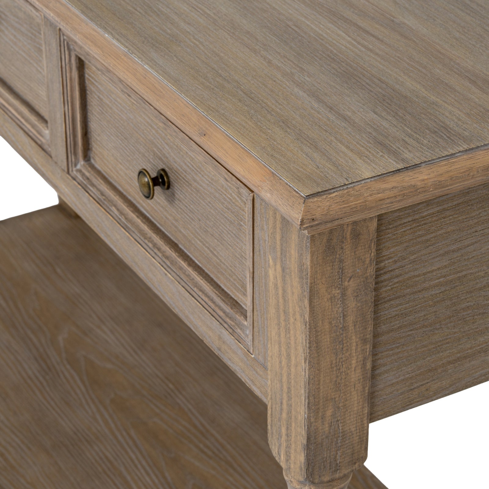 Close-up of the Laurent Wood Console Table with 3 Drawers & Shelf showcasing the natural wood grain, framed drawer detailing, antique brass knob, moulded tabletop edge and handcrafted timber construction.