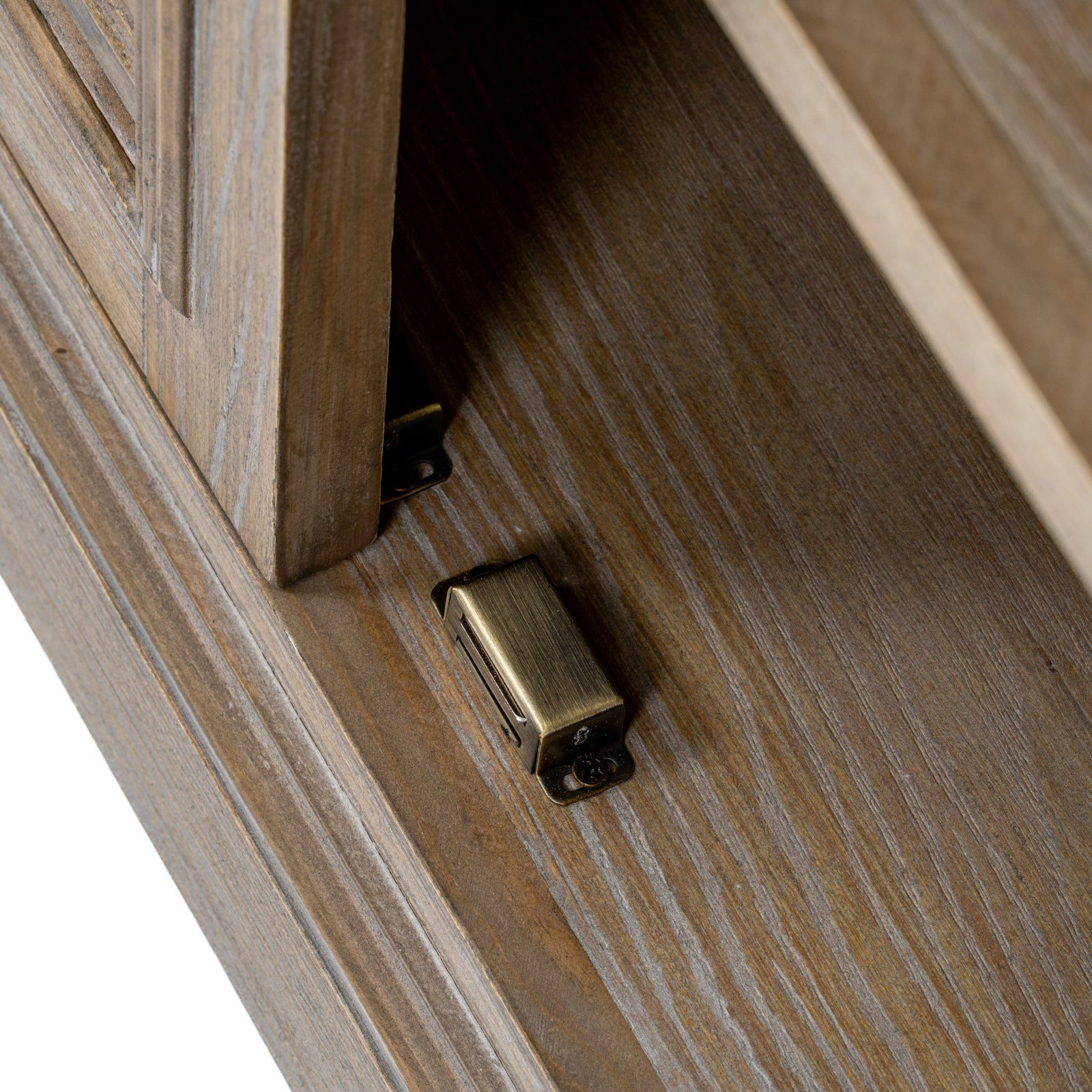 Close-up detail of the Laurent Wood Storage Chest with 2 Doors & 2 Drawers highlighting the premium magnetic door catch, natural wood interior, quality craftsmanship and durable cabinet construction.