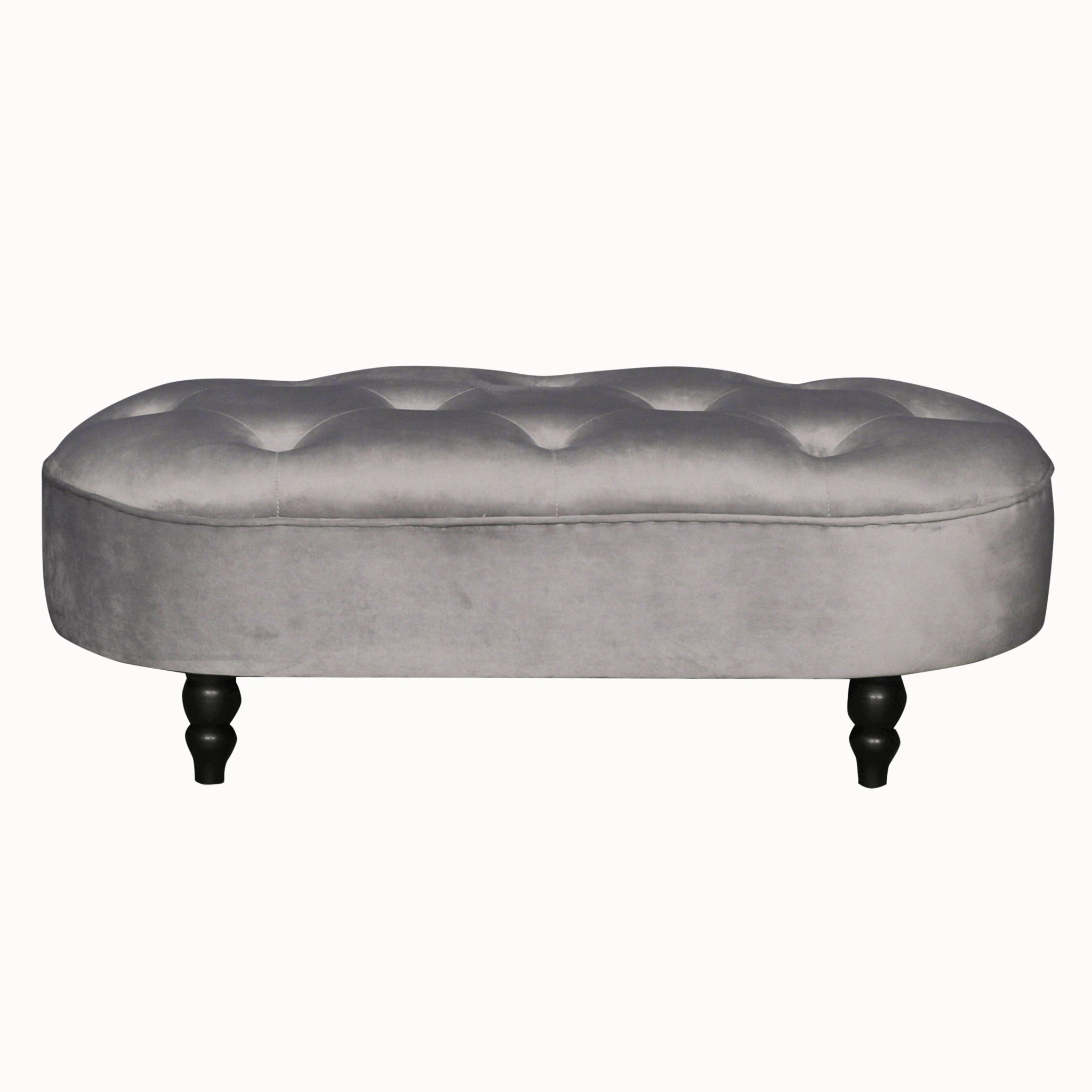 Lucien Grey Velvet Upholstered Bedroom Bench with Black Legs shown on a white background, featuring a deep button tufted velvet seat, rounded silhouette and turned black wooden legs.