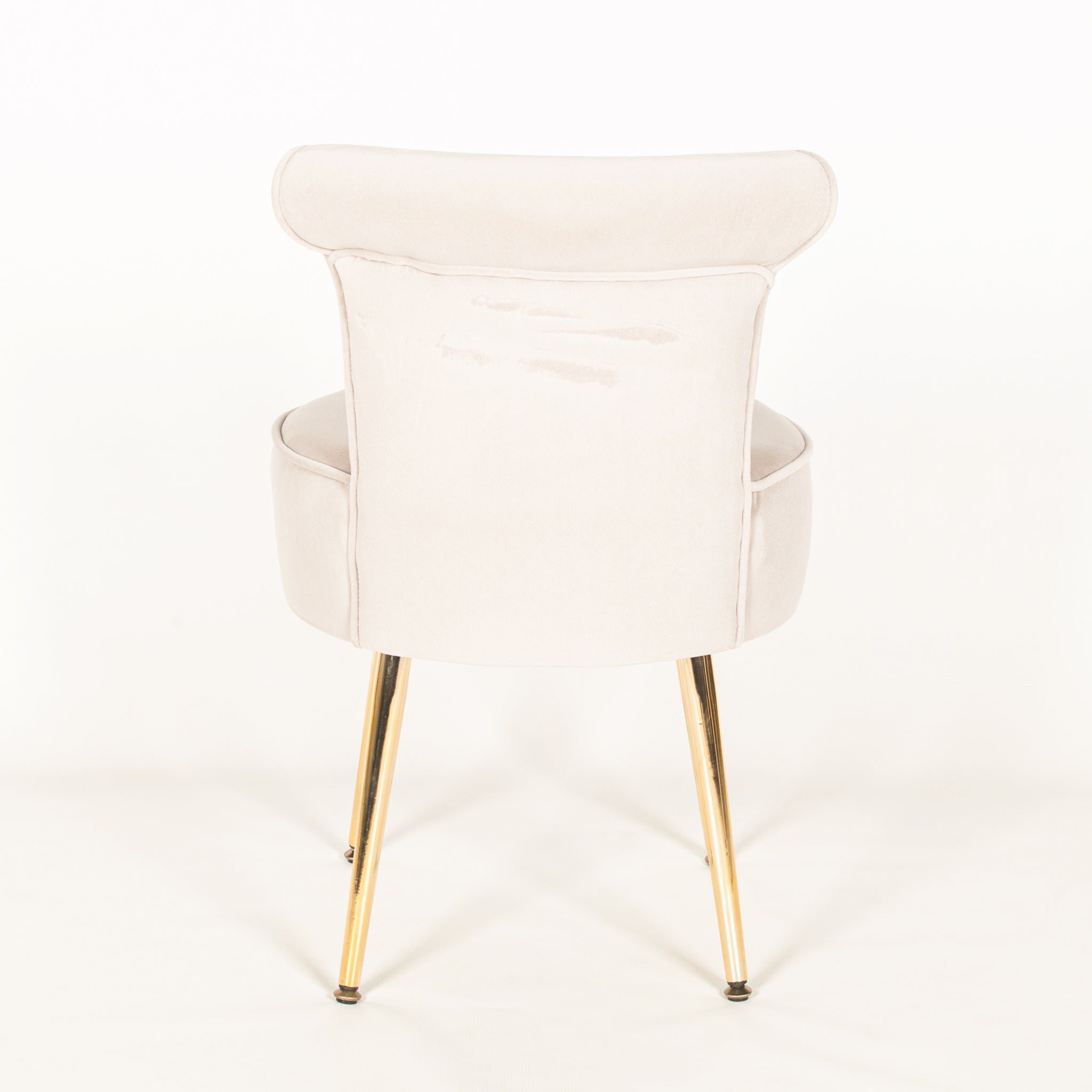 Rear view of the Lucien Light Grey Velvet Accent Bedroom Chair with Gold-Plated Legs featuring the smooth upholstered backrest, tailored stitching, curved contemporary profile and polished gold-plated legs.