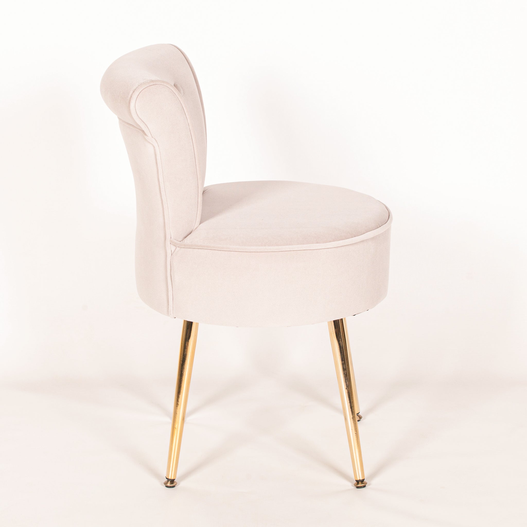 Side profile of the Lucien Light Grey Velvet Accent Bedroom Chair with Gold-Plated Legs displaying the curved wraparound backrest, luxurious velvet upholstery and modern gold-plated metal legs.