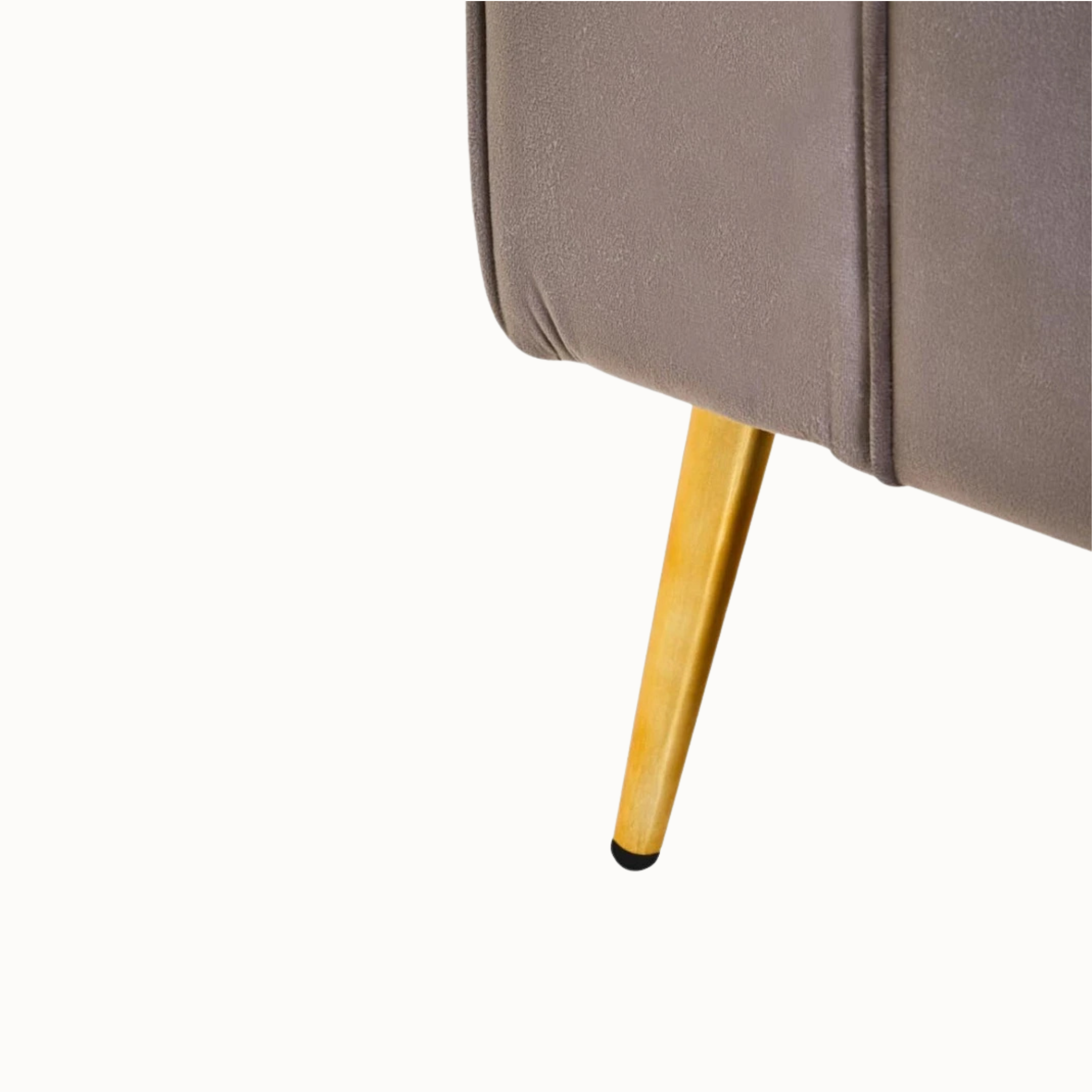 Close-up of Lucien mink velvet storage bench showing a tapered gold iron leg on a plain white background.