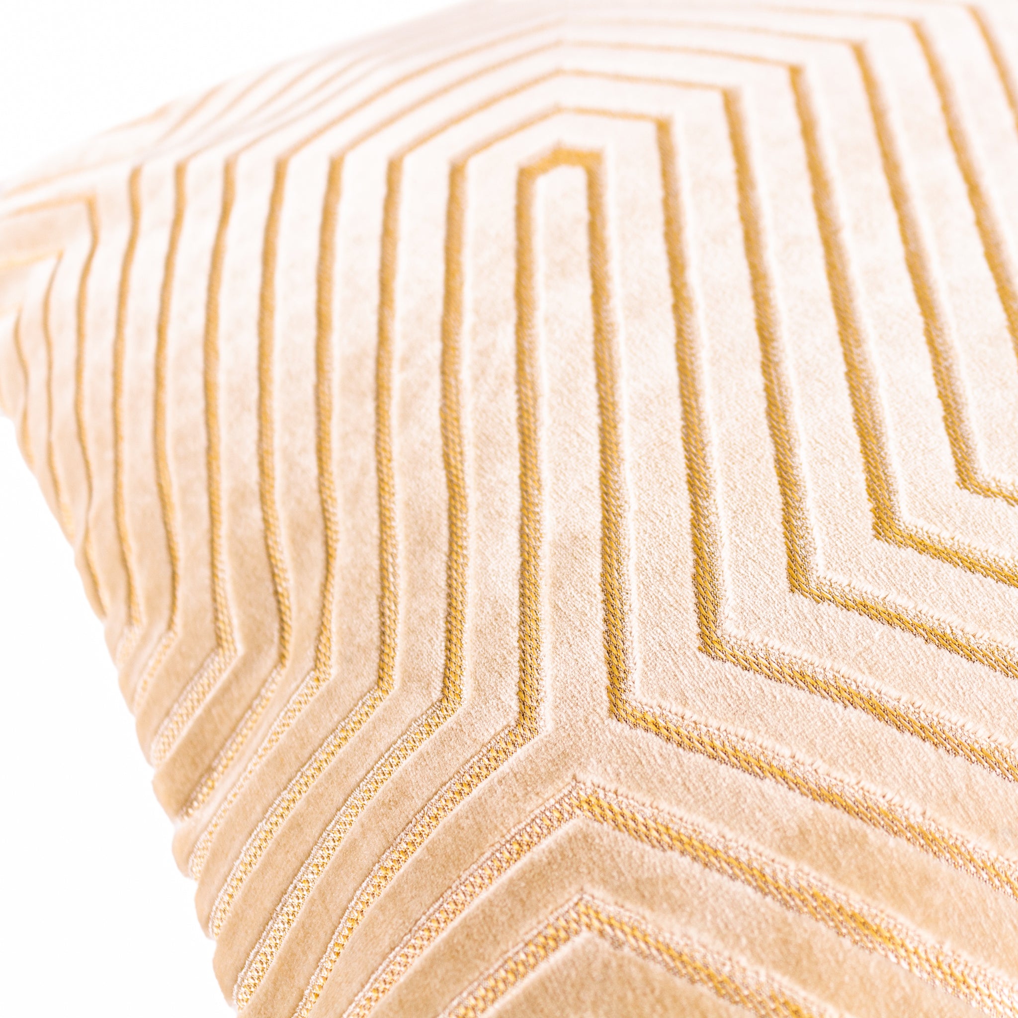 Close-up of the Maëva Geometric Cut Velvet Cushion in Ivory, highlighting the raised geometric velvet pattern, fine linear detailing and soft textured fabric.
