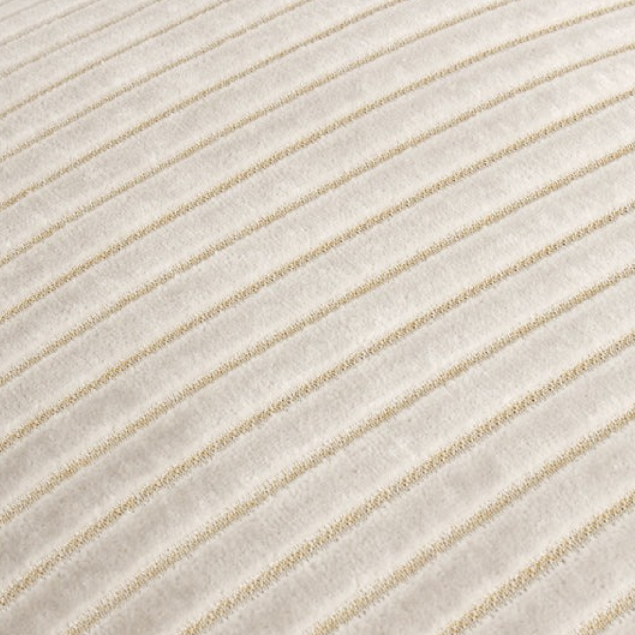 Close-up of Maëva oyster cream cut velvet cushion showing raised striped texture on a neutral cream background.