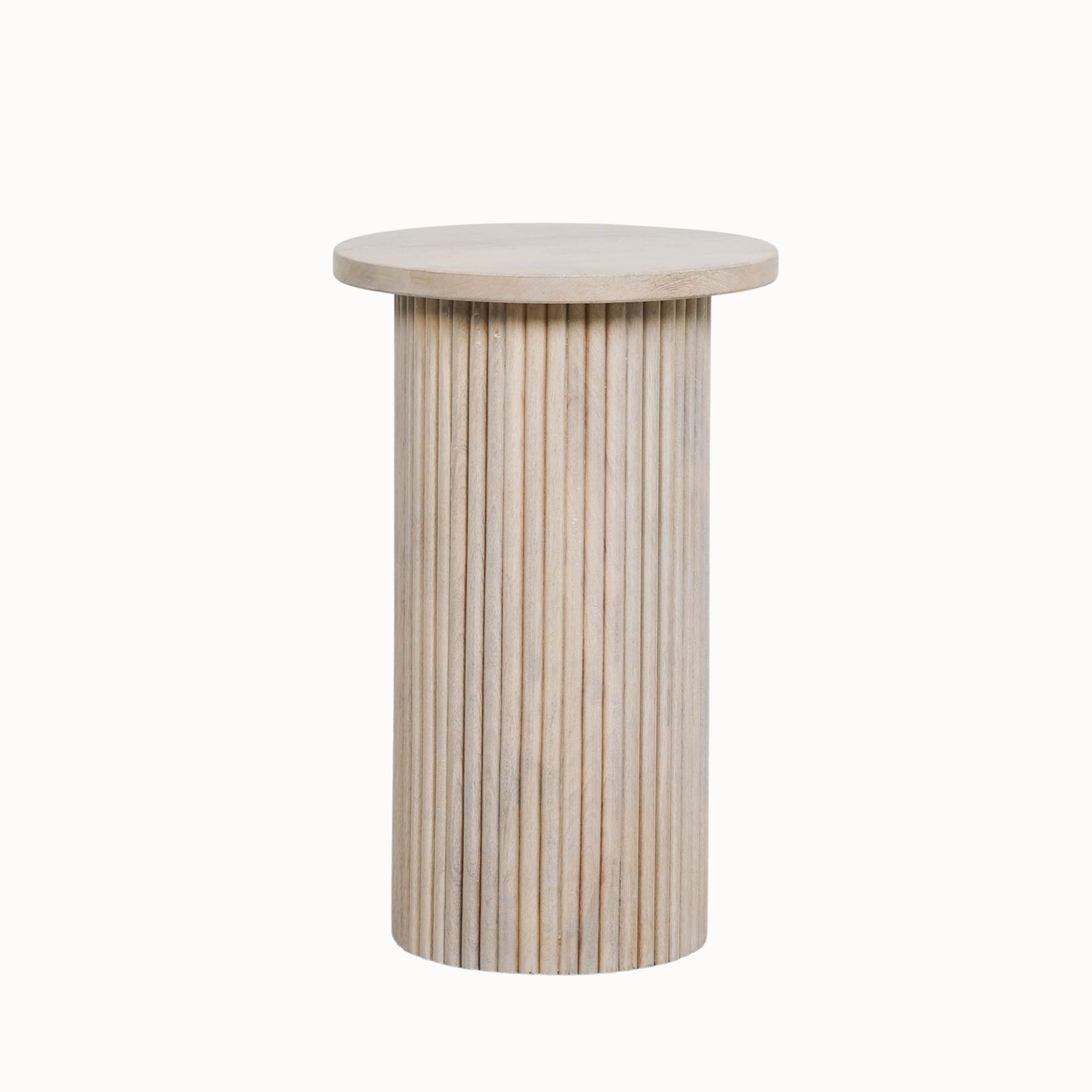Margaux ribbed round side table in washed mango wood shown on a clean white background.