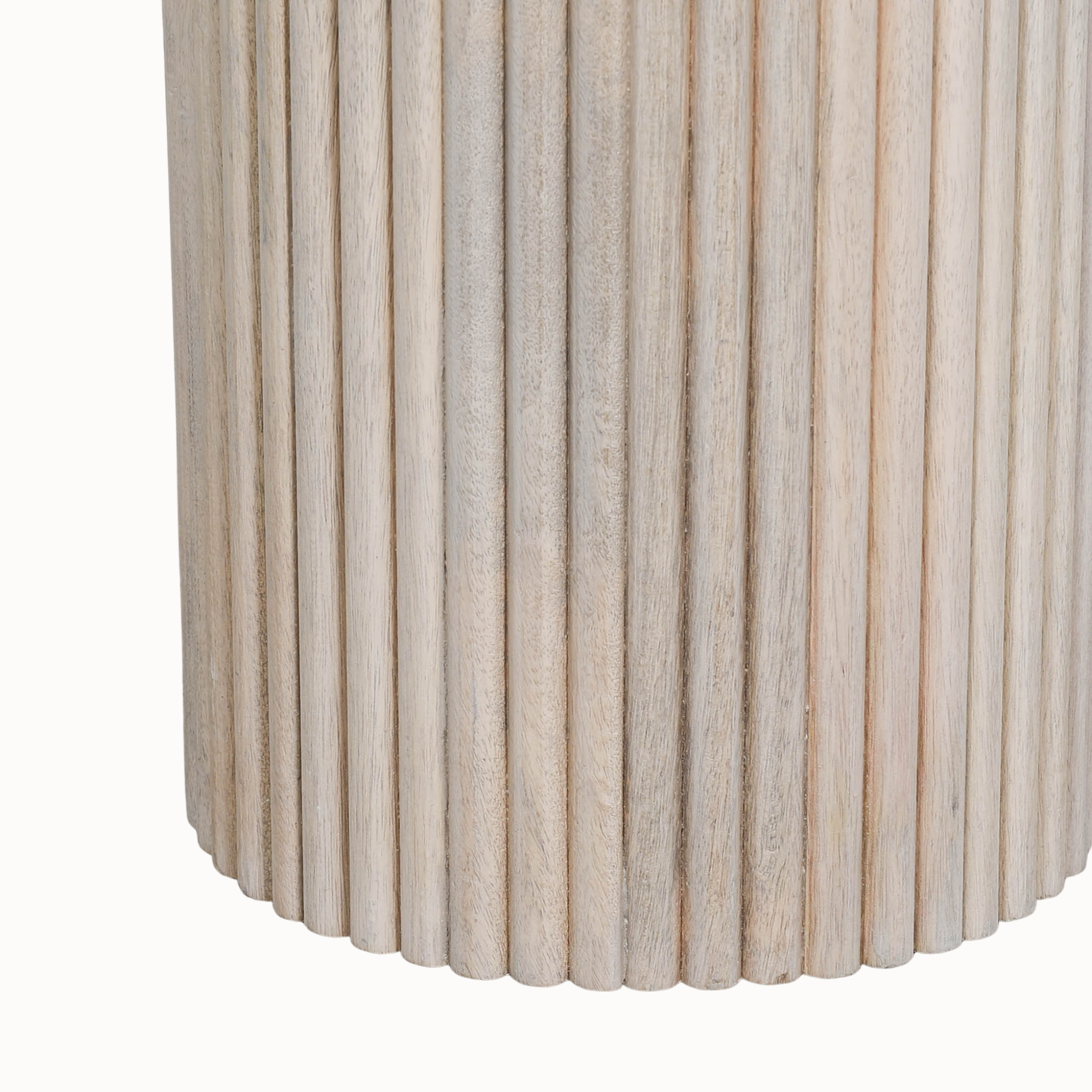 Close-up of Margaux washed mango wood side table showing ribbed cylindrical base on a white background.