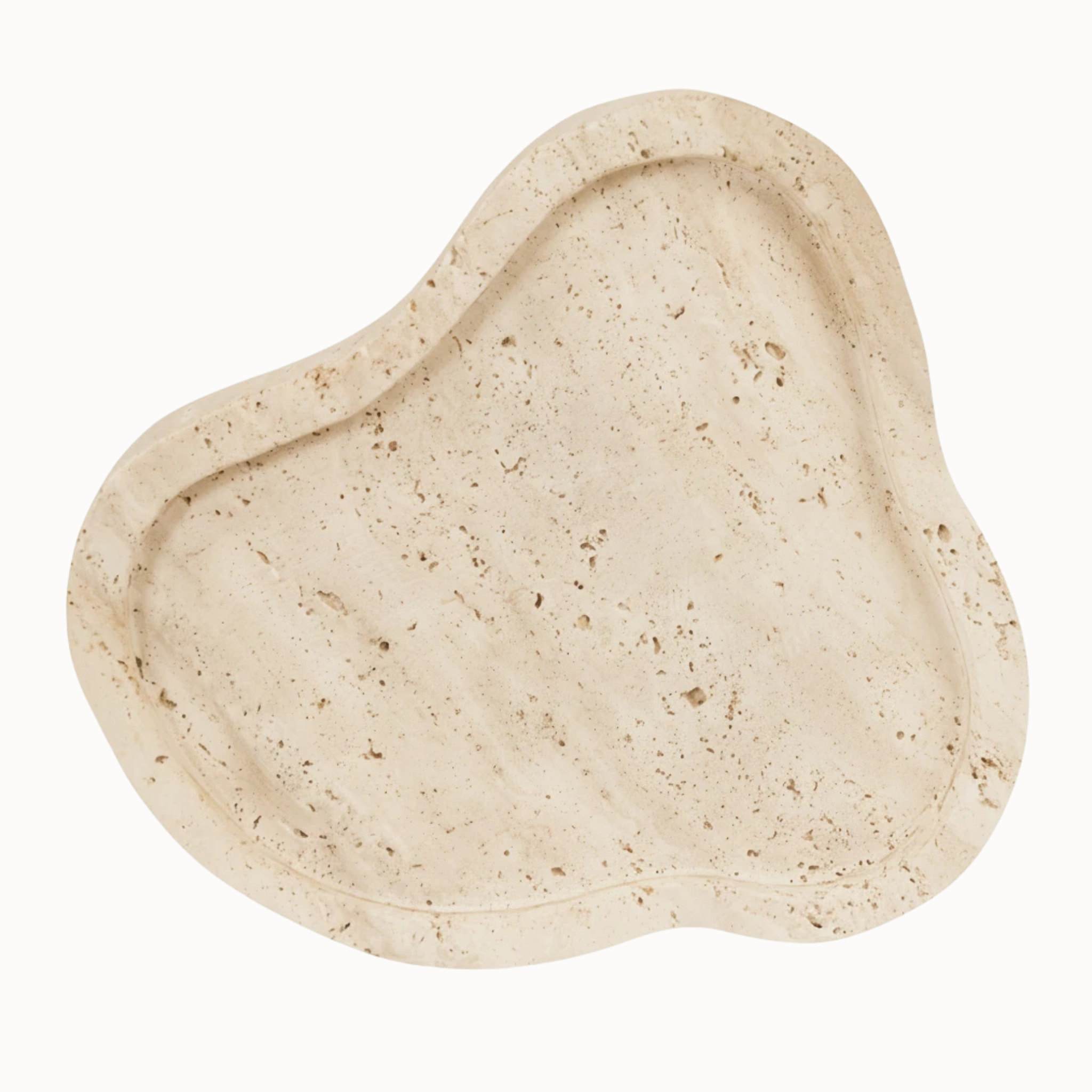 Top view of Noé irregular travertine tray with organic curves, raised edge and speckled beige stone on white.