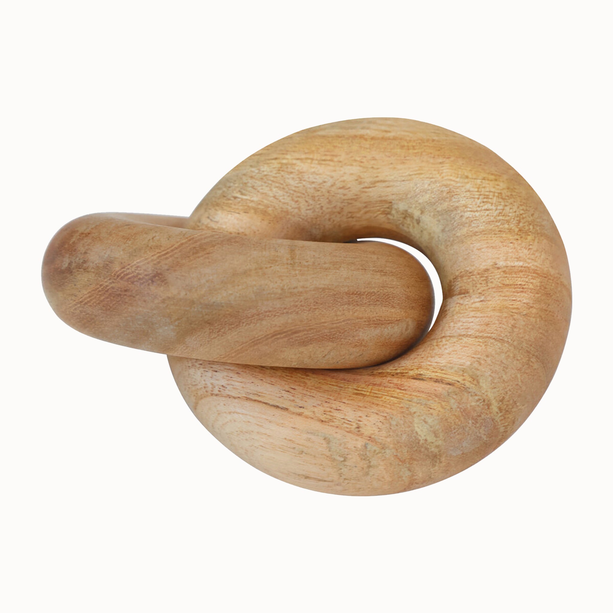 Noé natural wooden knot decorative object viewed from above, showcasing its interlocking sculptural form, warm natural wood tones and distinctive handcrafted grain.
