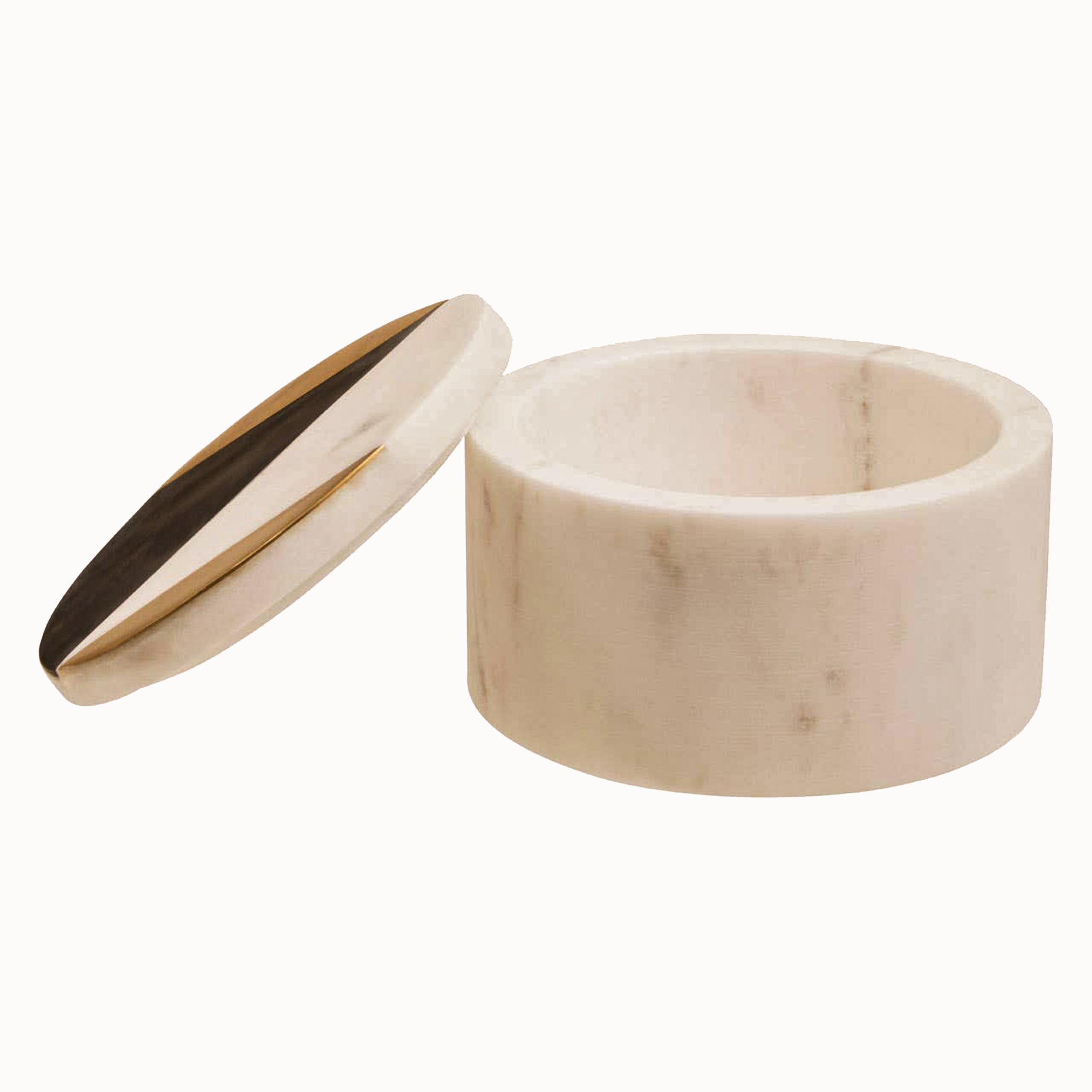 Noé Rounded Trinket Box shown open with its smooth white marble interior and decorative geometric lid featuring contrasting black, white and gold detailing.