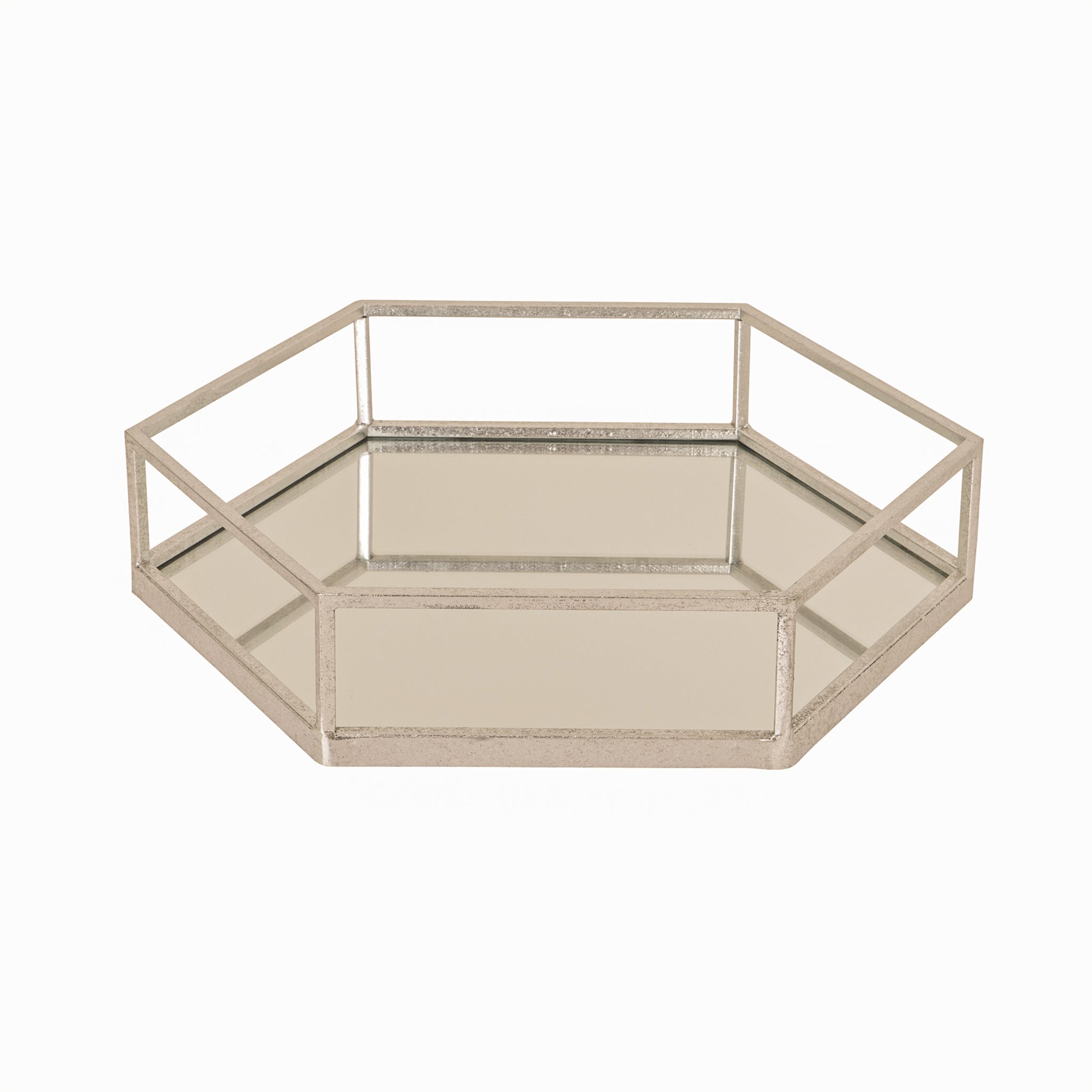 Large Noé silver metal and glass hexagon tray with mirrored glass base and geometric silver frame, perfect for styling candles, perfume bottles, decorative accessories or serving drinks with contemporary elegance.