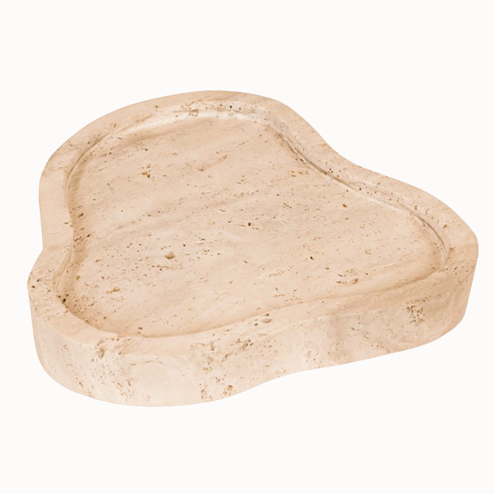Noé Travertine Tray in an irregular organic stone form styled white background.