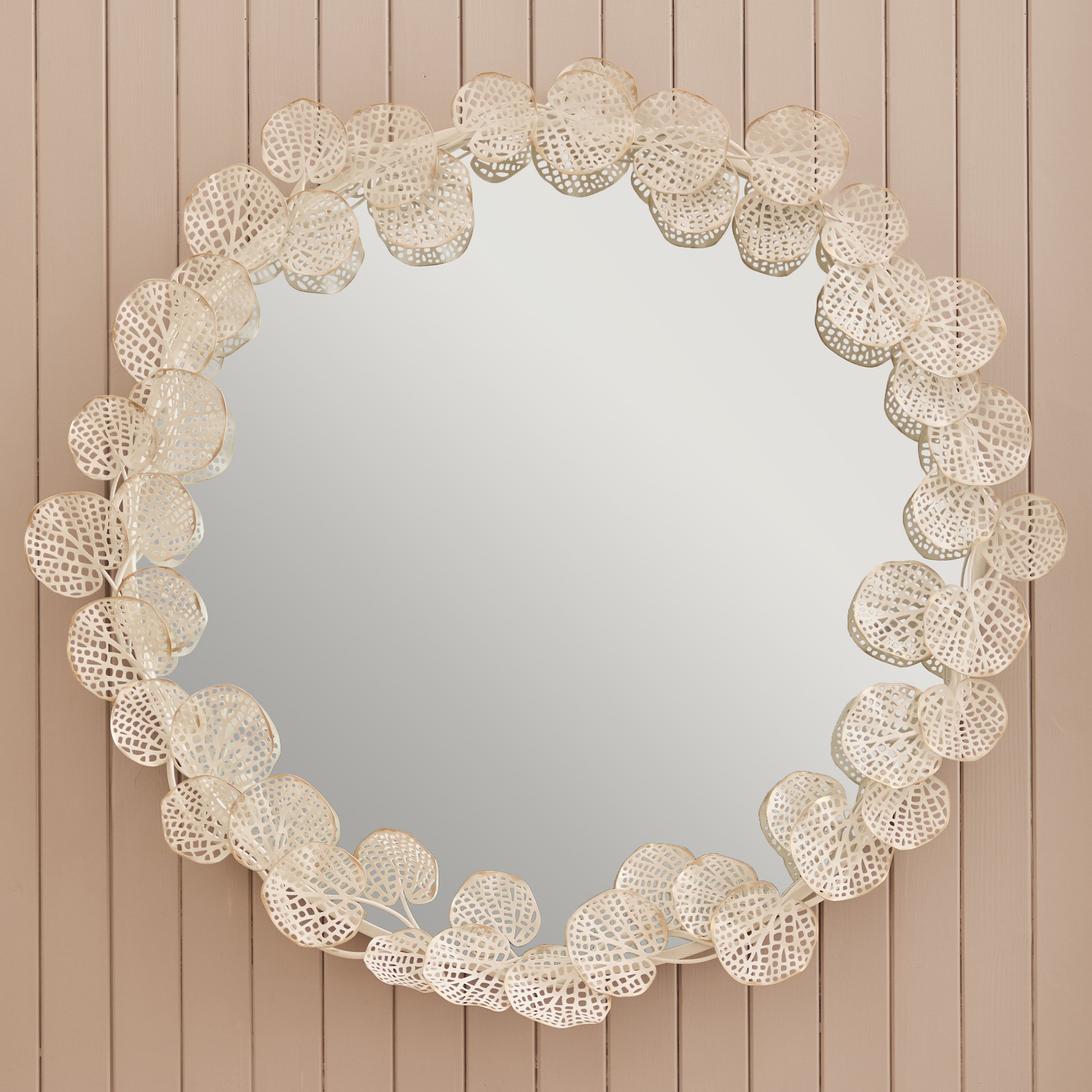 Detailed view of the Odette 109cm Round Wall Mirror showcasing the elegant antique white and gold floral frame, decorative botanical leaf design and premium handcrafted metal construction.