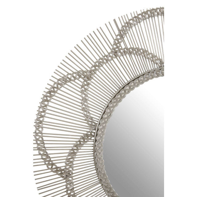 Close-up detail of the Odette 81cm Floral Wall Mirror highlighting the handcrafted silver petal frame, woven metal edging and radiating wire design, showcasing the premium craftsmanship and decorative finish.