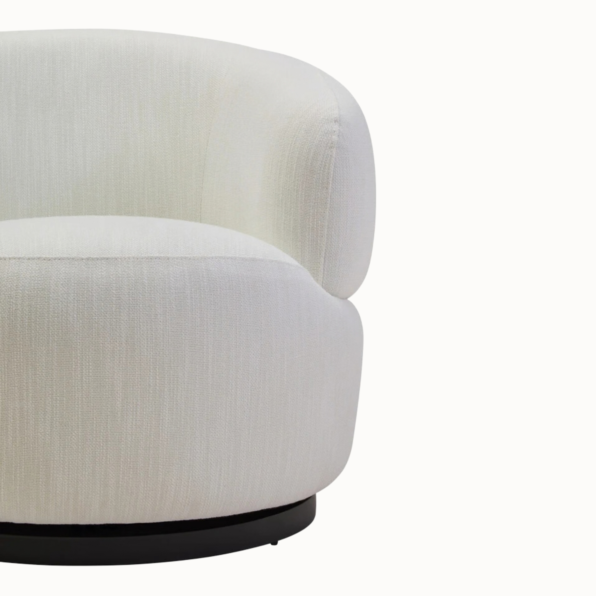 Close-up of Odile textured cream armchair showing curved upholstered back, seat and black base on white background