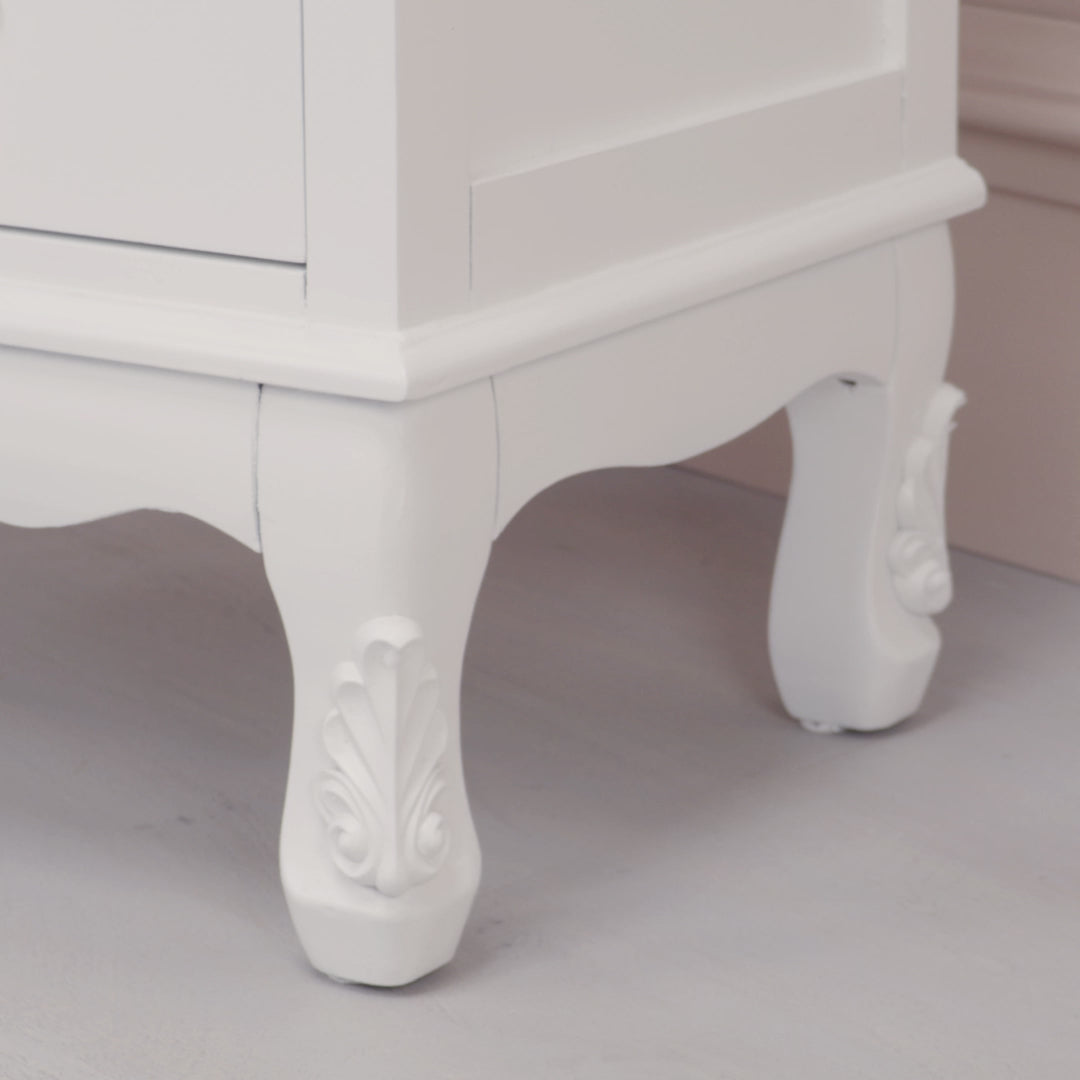 Close-up video of Vivienne white mirrored armoire showing carved details, mirror door and white painted finish.