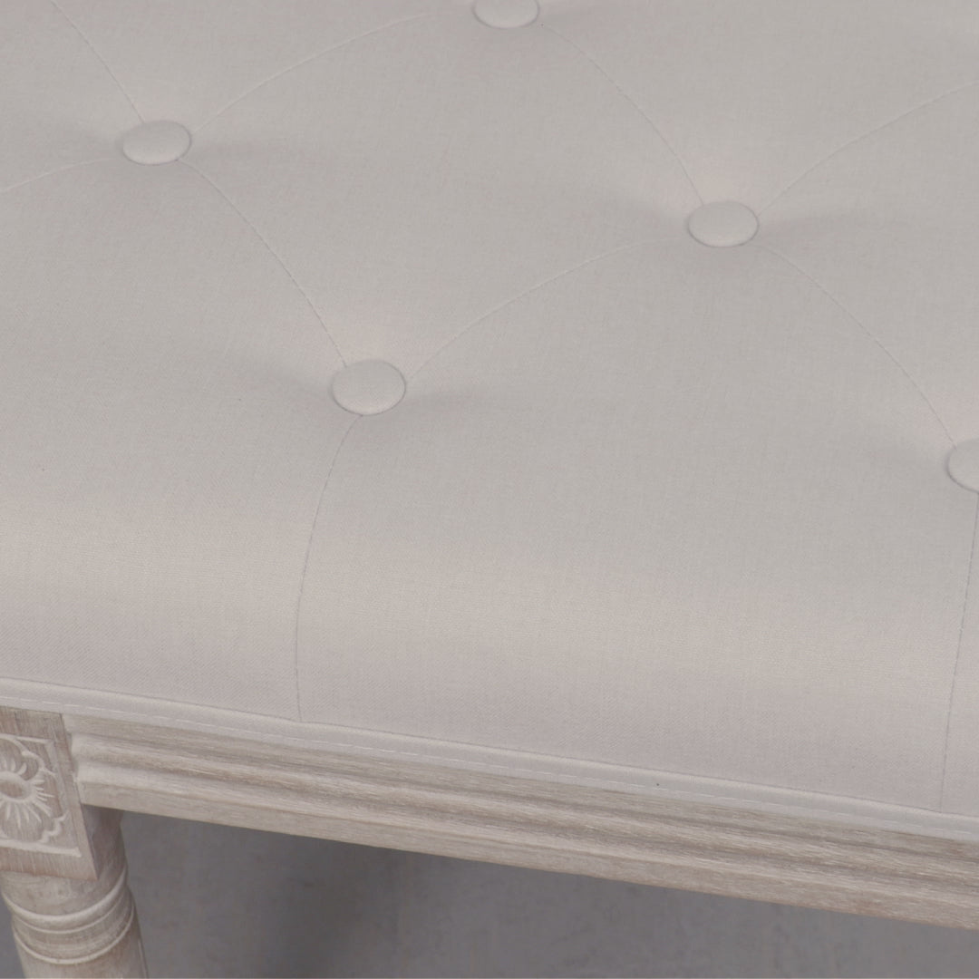 Product video of the Camille Louis Upholstered Bench featuring a beige button tufted linen seat, hand-carved washed birch wood frame and turned legs, showing the bench from multiple angles and highlighting its elegant French Louis craftsmanship and premium upholstery.