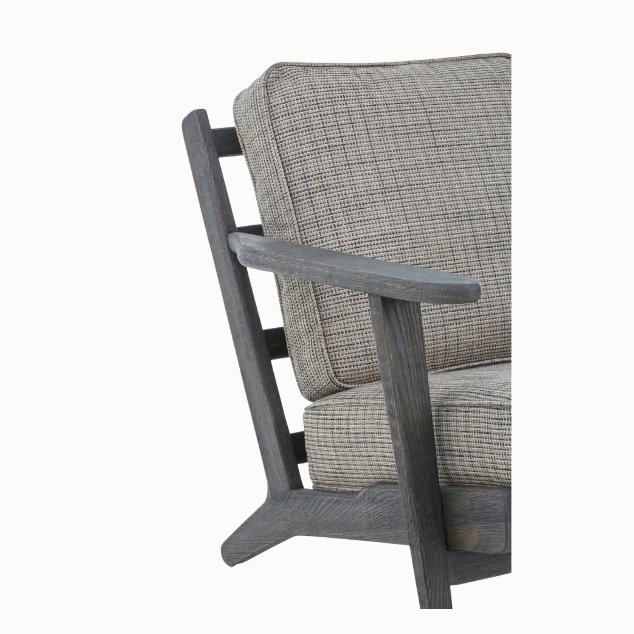 Rear angled view of Rémi grey tweed armchair and black American oak frame against a plain white background.