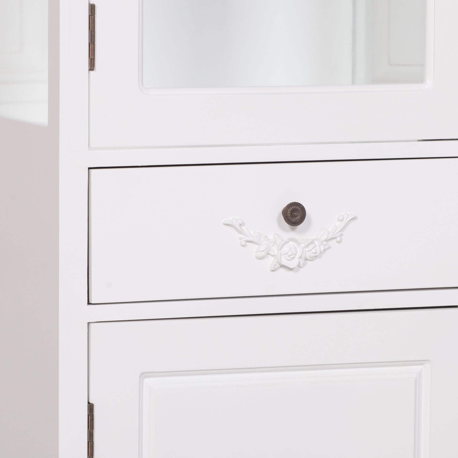 Close-up of the Rosalie Tall French Glass Display Cabinet with Drawer in Antique White highlighting the decorative carved drawer front, antique-style knob and elegant French furniture craftsmanship.