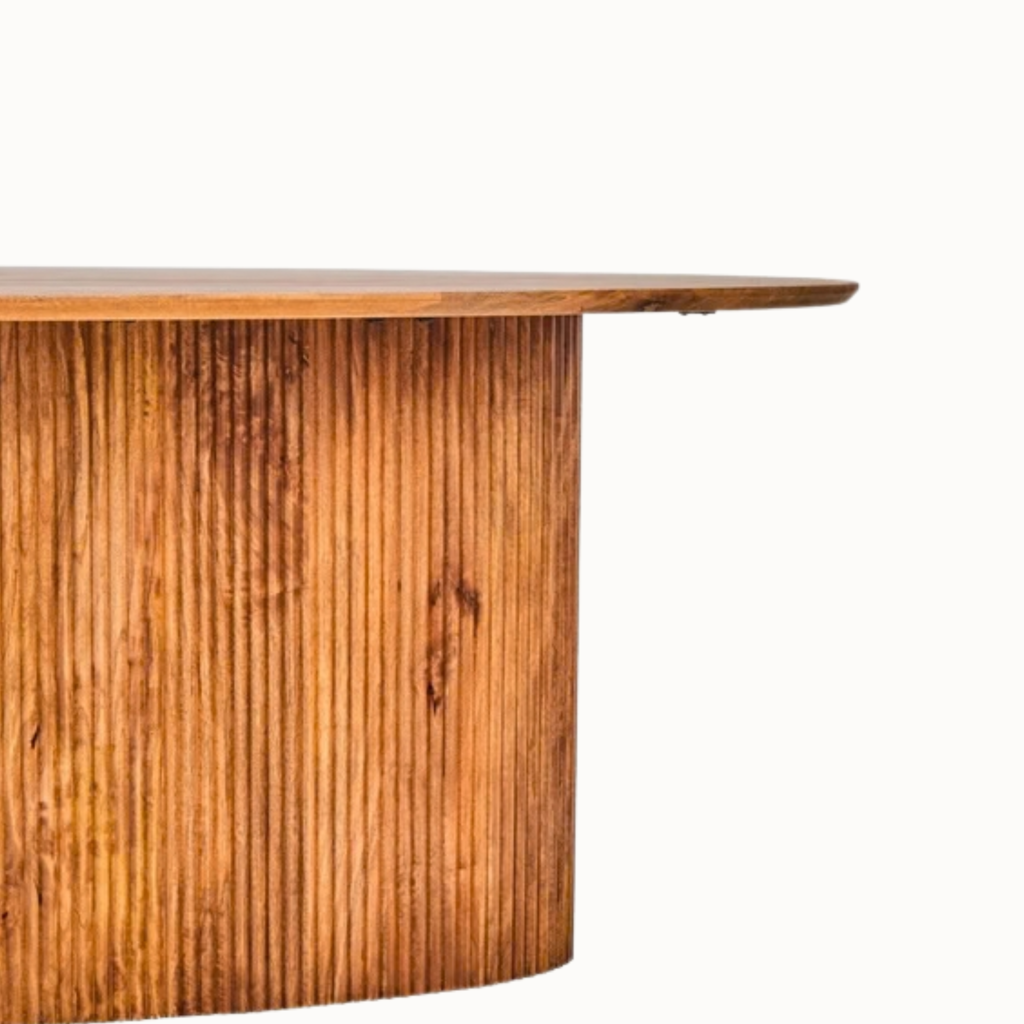 Close-up of Sabine dining table ribbed mango wood pedestal and tabletop edge against a white background.
