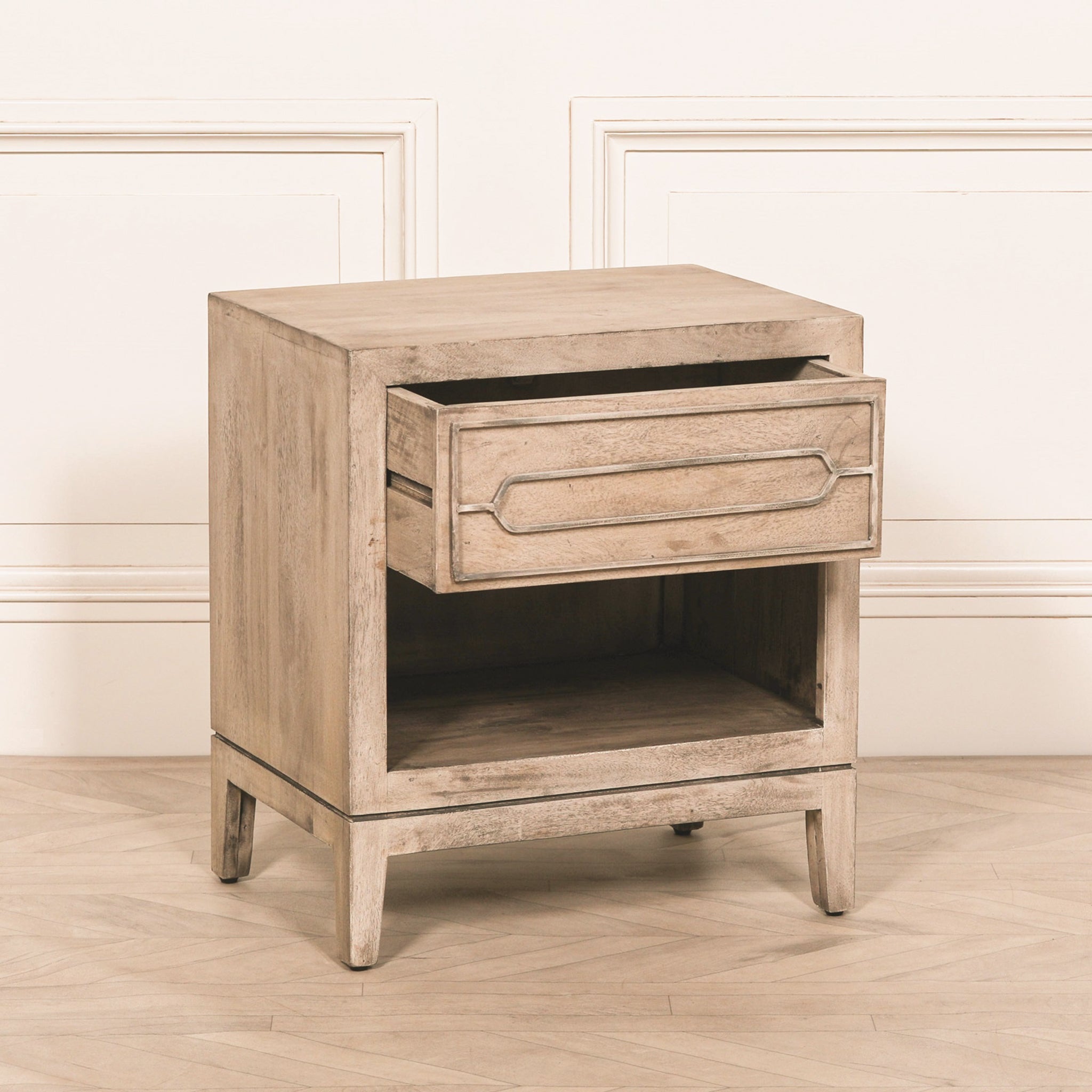 Soline rustic mango wood bedside table with the drawer open, displaying its spacious drawer storage, open lower shelf and solid mango wood construction, ideal for storing bedside essentials in stylish bedrooms.
