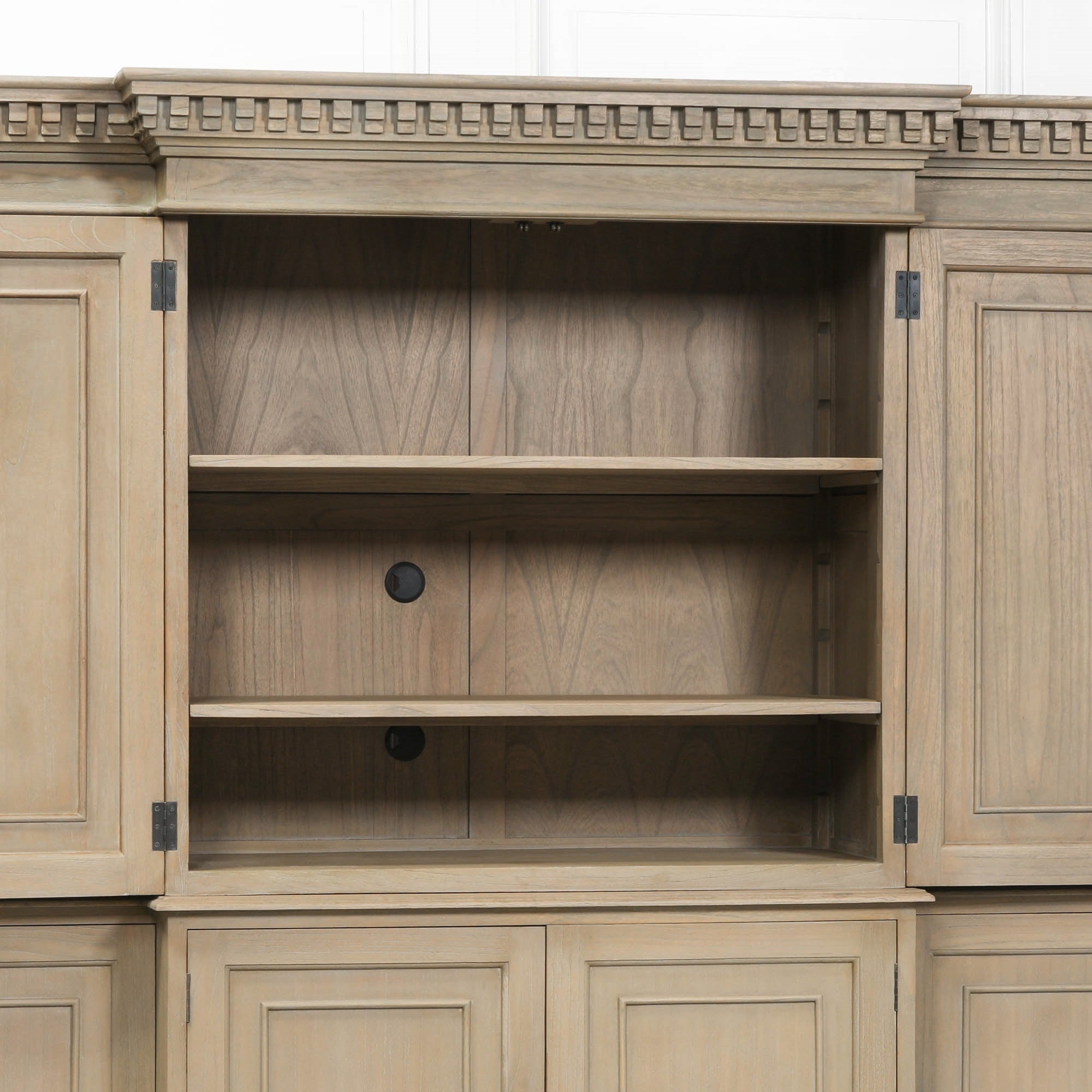 Open centre section of the Théodore Extra Large Triple Breakfront TV Cabinet displaying adjustable shelving, cable management access, media storage space and rustic white cedar wood interior.