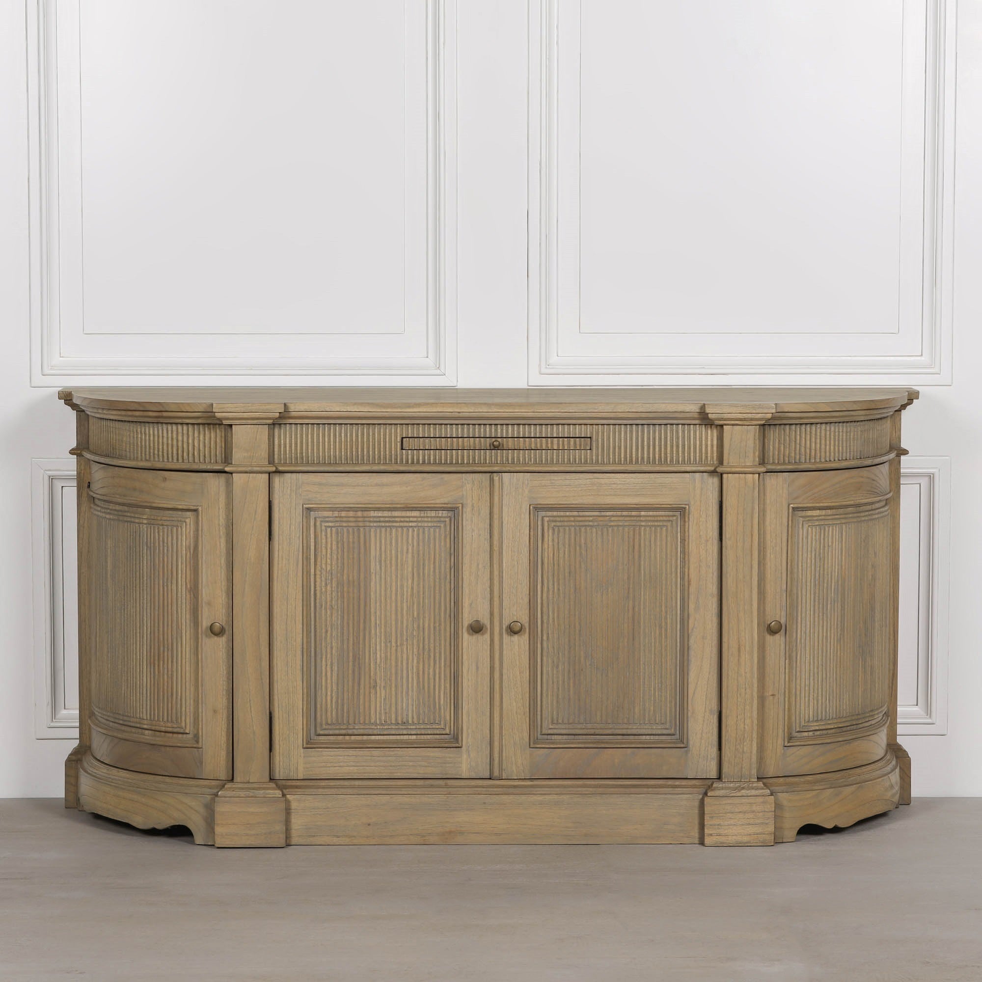 Front elevation of the Théodore Rustic Fluted Buffet Sideboard handcrafted from white cedar wood featuring fluted detailing, curved side cabinets and elegant four-door storage.