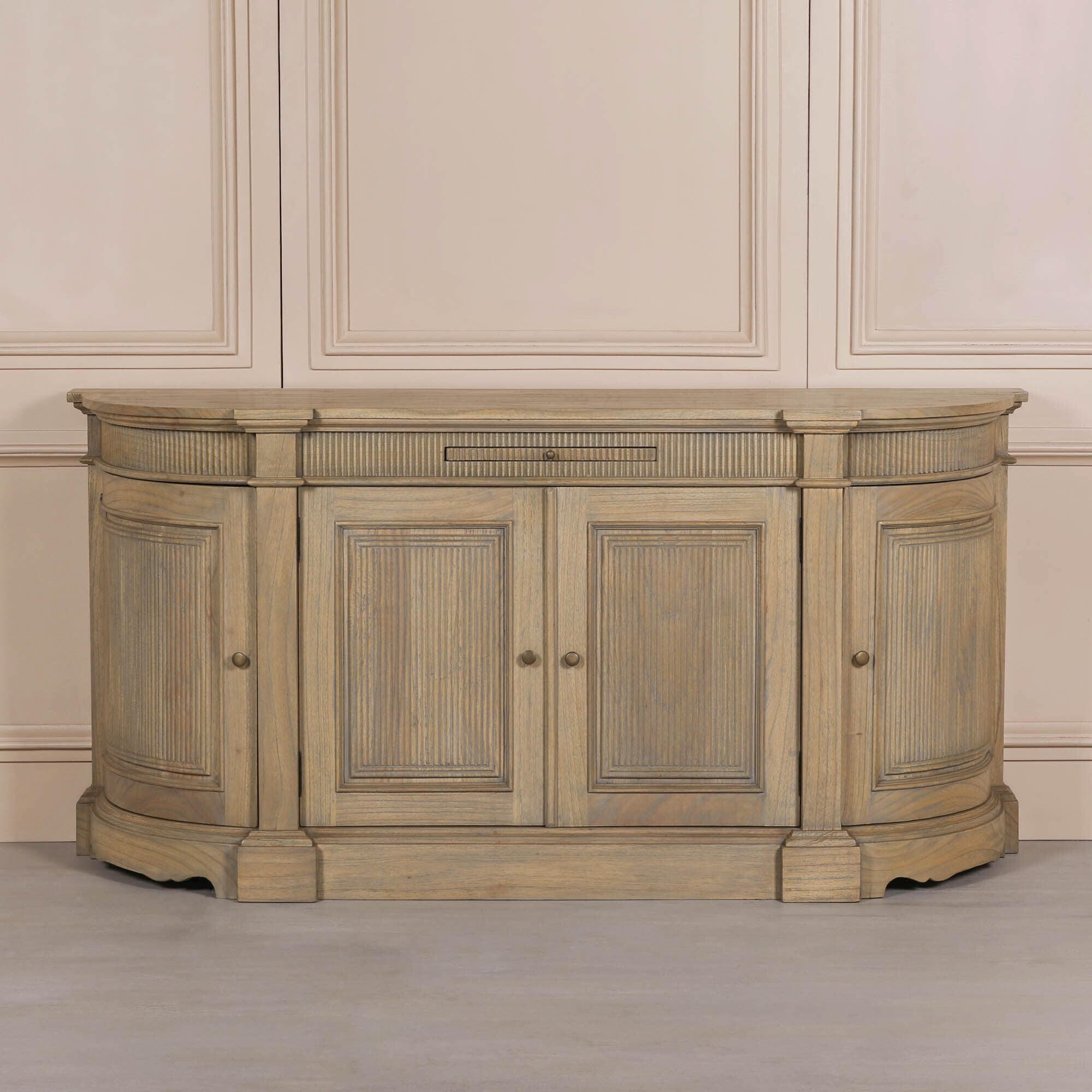 Front view of the Théodore Rustic Fluted Buffet Sideboard handcrafted from white cedar wood with elegant fluted detailing, curved end cabinets, four-door storage and timeless rustic design.
