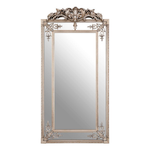 Valère champagne gilded rectangular wall mirror with ornate crest and corner scrollwork on a white background.