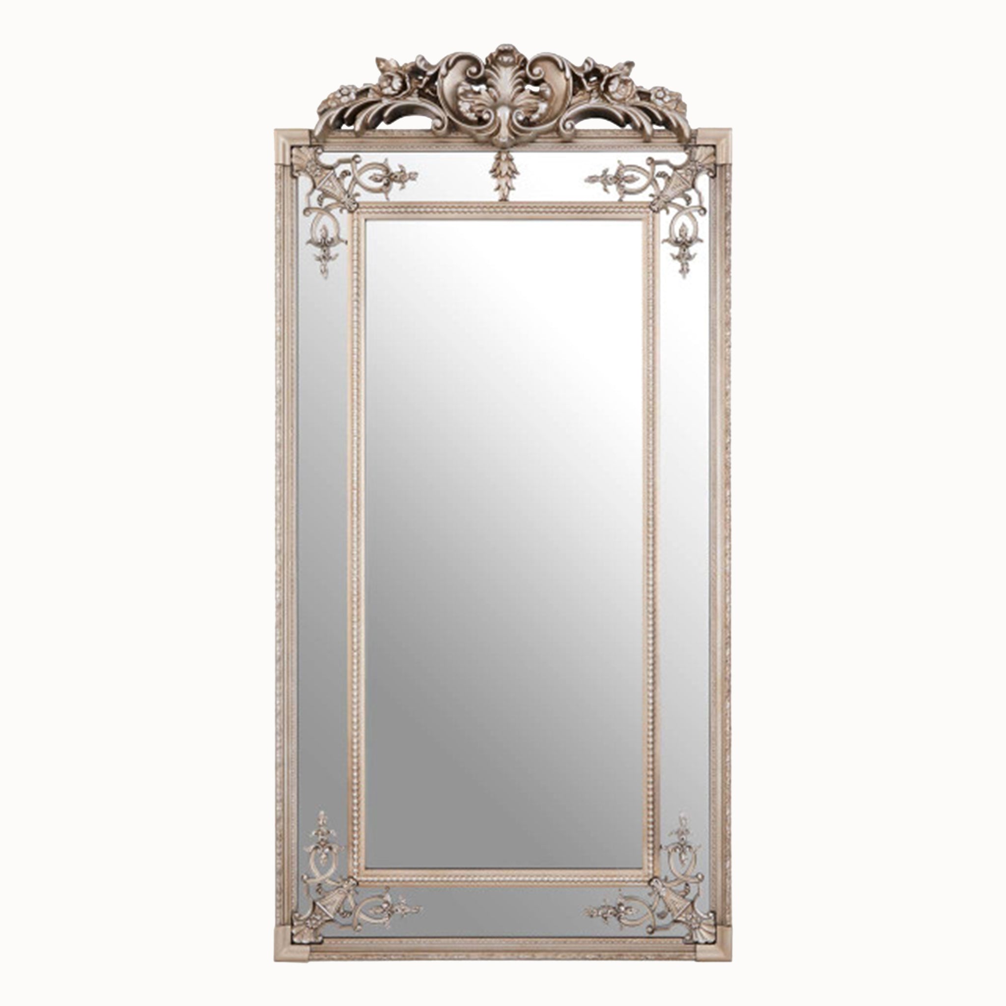 Valère Ornate Champagne Gilded Wall Mirror, a tall rectangular decorative mirror with an elaborate sculpted crest, floral scrollwork and intricate champagne-finish frame.