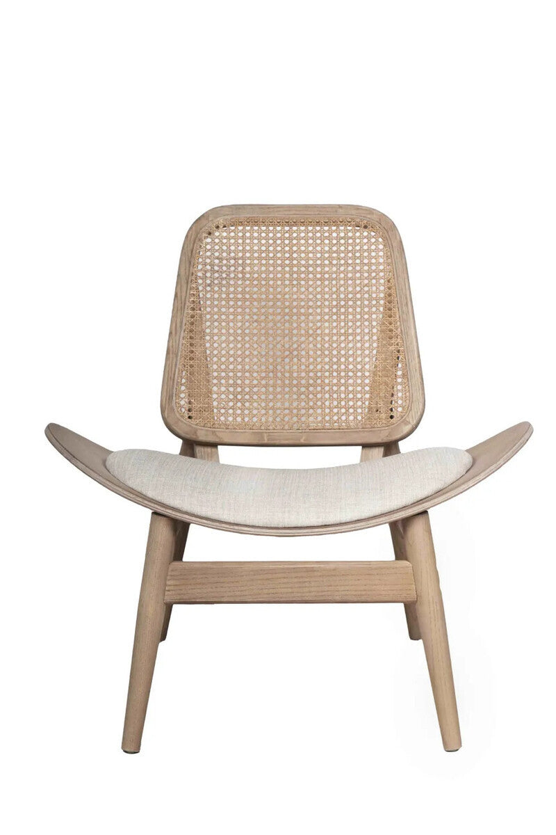 Front view of the Vincent Cane Back Lounge Chair featuring a natural woven cane backrest, beige fabric upholstered seat, sculptural curved armrests and a washed solid elm wood frame, showcasing a timeless mid-century modern lounge chair for luxury living rooms, reading corners and contemporary interiors.